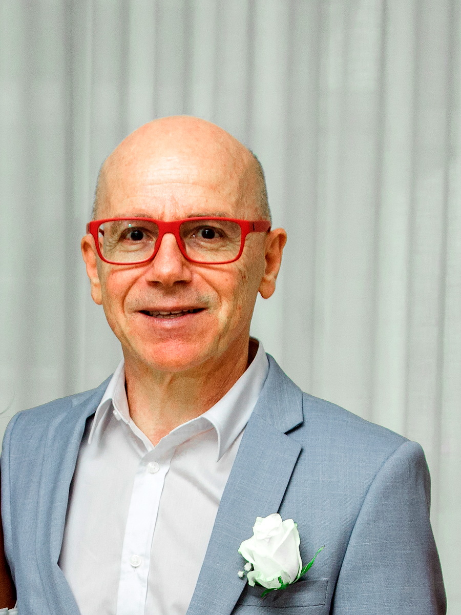 Portrait of Danilo Barbero in a light blue suit