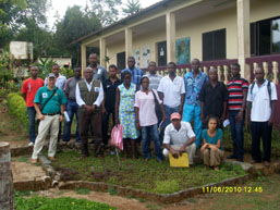 Danilo Barbero and a group of participants outside a building
